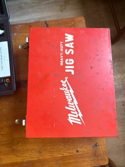 Milwaukee heavy duty jig saw wit blades