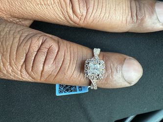 One 14 karat yellow gold ring containing 48 tab described in detail below. Trademarked and sta diamonds, ed "14K LGD".