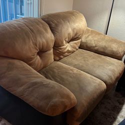 Small tan loveseat couch