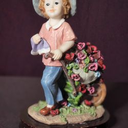 Giovanni Collection Girl Pulling Wheelbarrow Of Roses