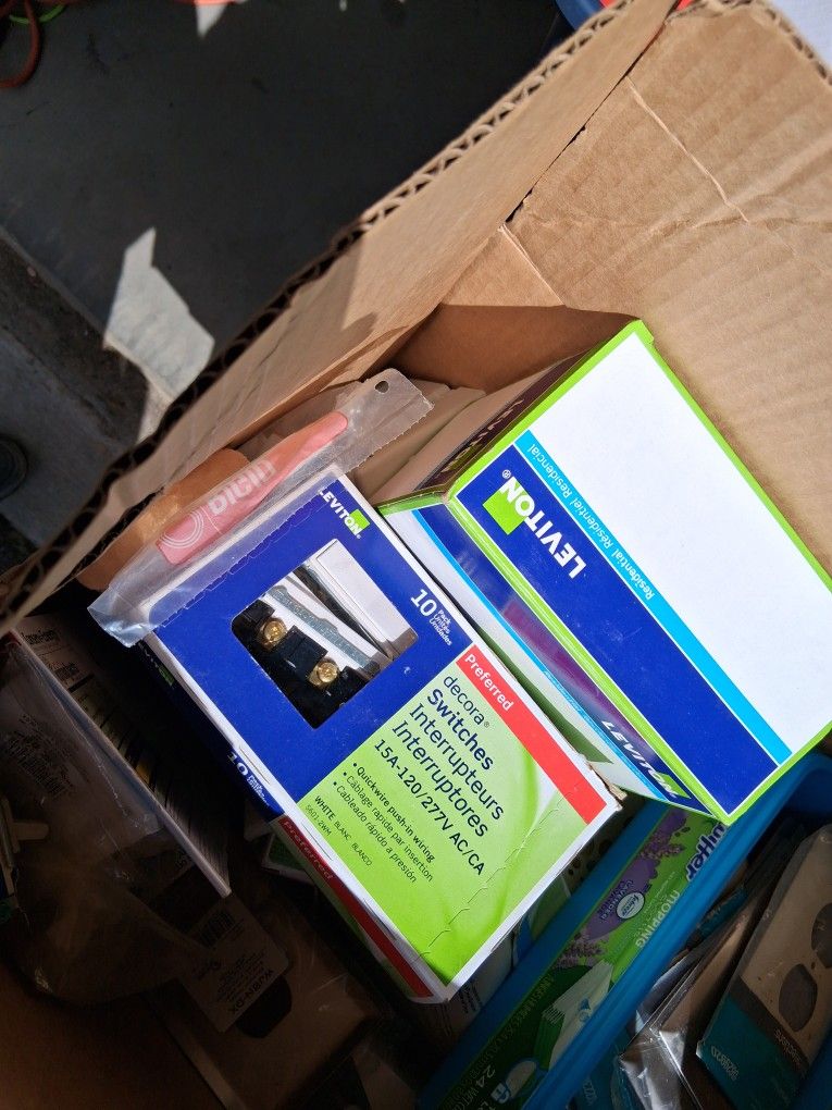 Box Of Electrical Switches And Platesl