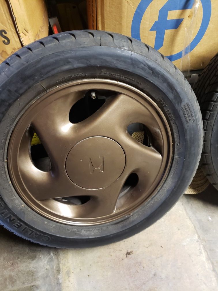 FOUR CRX CIVIC rims. With tires. Sprayed different color, but removable. Great condition.