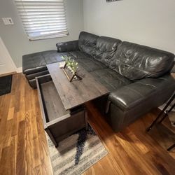 Real Leather Couch with Lift Top Coffee Table. $400 OBO 