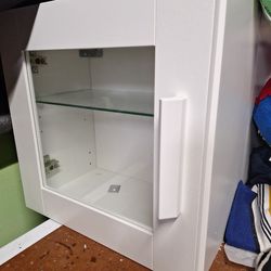 Two 16x16x9  wall display cabinets