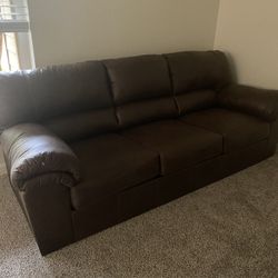 NEW The faux leather sofa is very soft