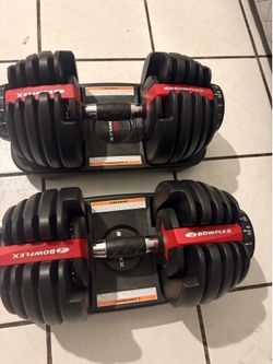 5/52.5 Bowflex adjustable dumbbells in like new condition