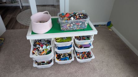 Custom Lego table with storage bins and large Lego jaul