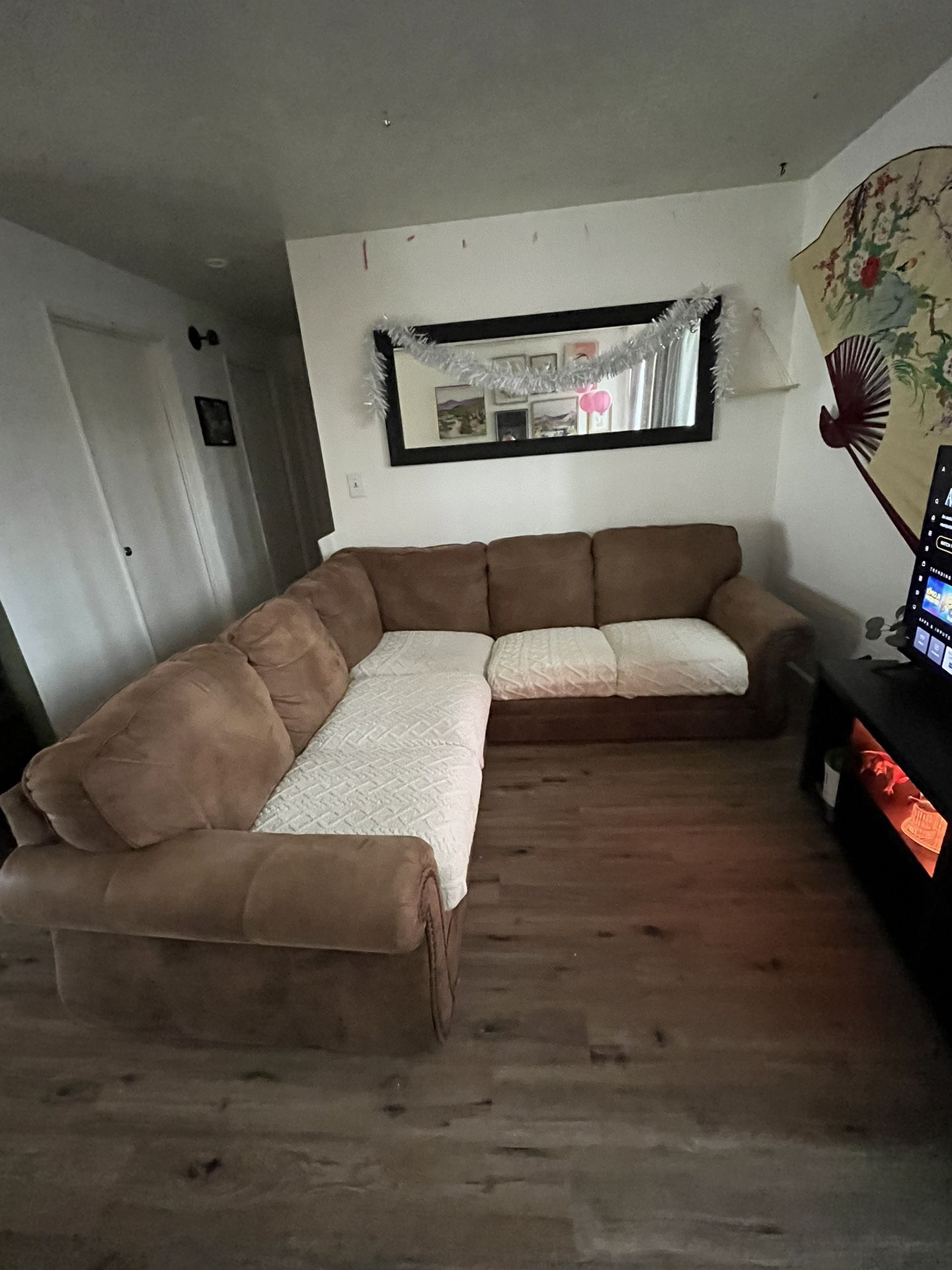 Brown Sectional Couch( With Couch Covers)