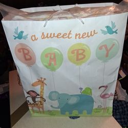 Baby stuff. Toddler suits, socks, quilt.