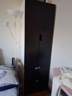 Wood closet.     Moving sale