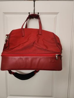 Tumi red leather/ canvas duffle travel bag