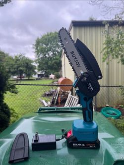 Mini Battery Operated Chainsaw With Battery And Charger