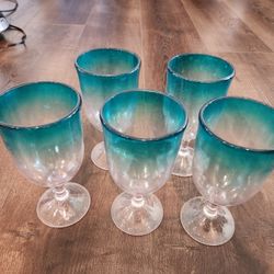 a set of 5 plastic wine glassesblue-to-clear gradient coloration, good condition, 7.5 inch tall 