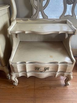 vintage French Provincial two-tier cream nightstand bedside table