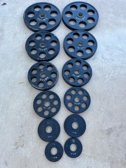 245lb rubber coated Olympic weight plate set