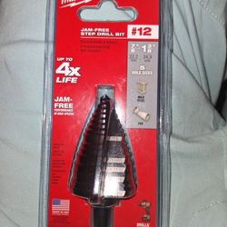 Jam free step drill bit #12