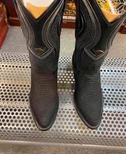 Botas de piel con suela roja para hombre