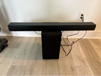 wireless active subwoofer included with LG soundbar and remote
