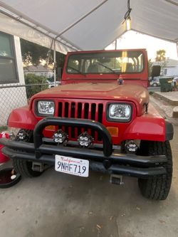 Red Jeep Wrangler YJ