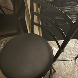 3 Bar Stools With  Black Seats 