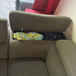 L-Shaped Gray Couch With Storage Space