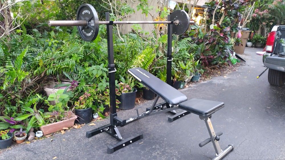 ADJUSTABLE BENCH/ SQUAT RACK / 7 FOOT BAR & PAIRS OF) : 35 LB. OLYMPIC PLATES