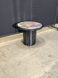 Striking Round Pedestal Coffee Table with Iridescent Top