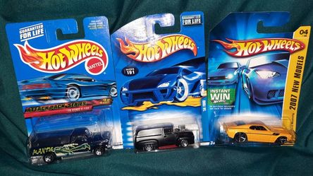 1999 Hot Wheels '79 Ford F-150, 2002 '56 Ford, And 2007 '69 Ford Mustang