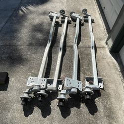 New 3750lb Torsion Axles With Hubs.  In Stock