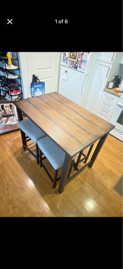 FREE DINING TABLE WITH 4 STOOLS