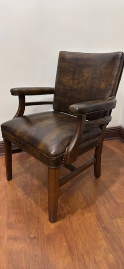 Pair of Retro brown leather arm chairs