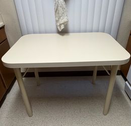 Dining table only (no chairs) measures 42"L × 30"W × 30"H . Desk