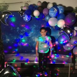 Planet space Birthday set up cúmplete with organic balloons and backdrop $250 , goodie bags $1.25 each cuts vinyl for surprise 1 dozen $5 , balloons