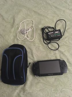 Psp 1000 with 7 games and movies