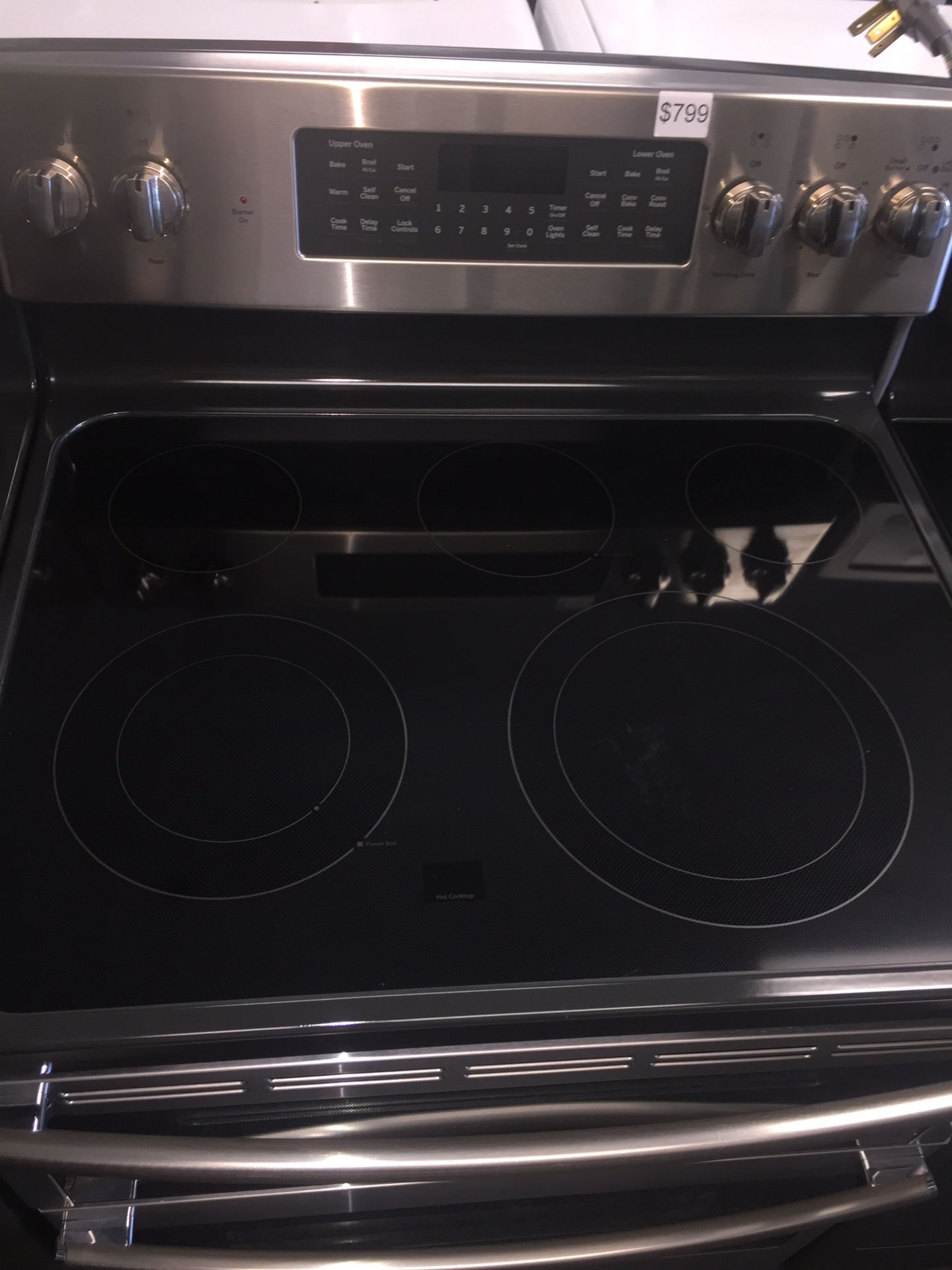GE stainless steel electric stove double oven 6 months warranty
