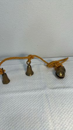 Vintage Brass etched bells from Indiana on heavy cord