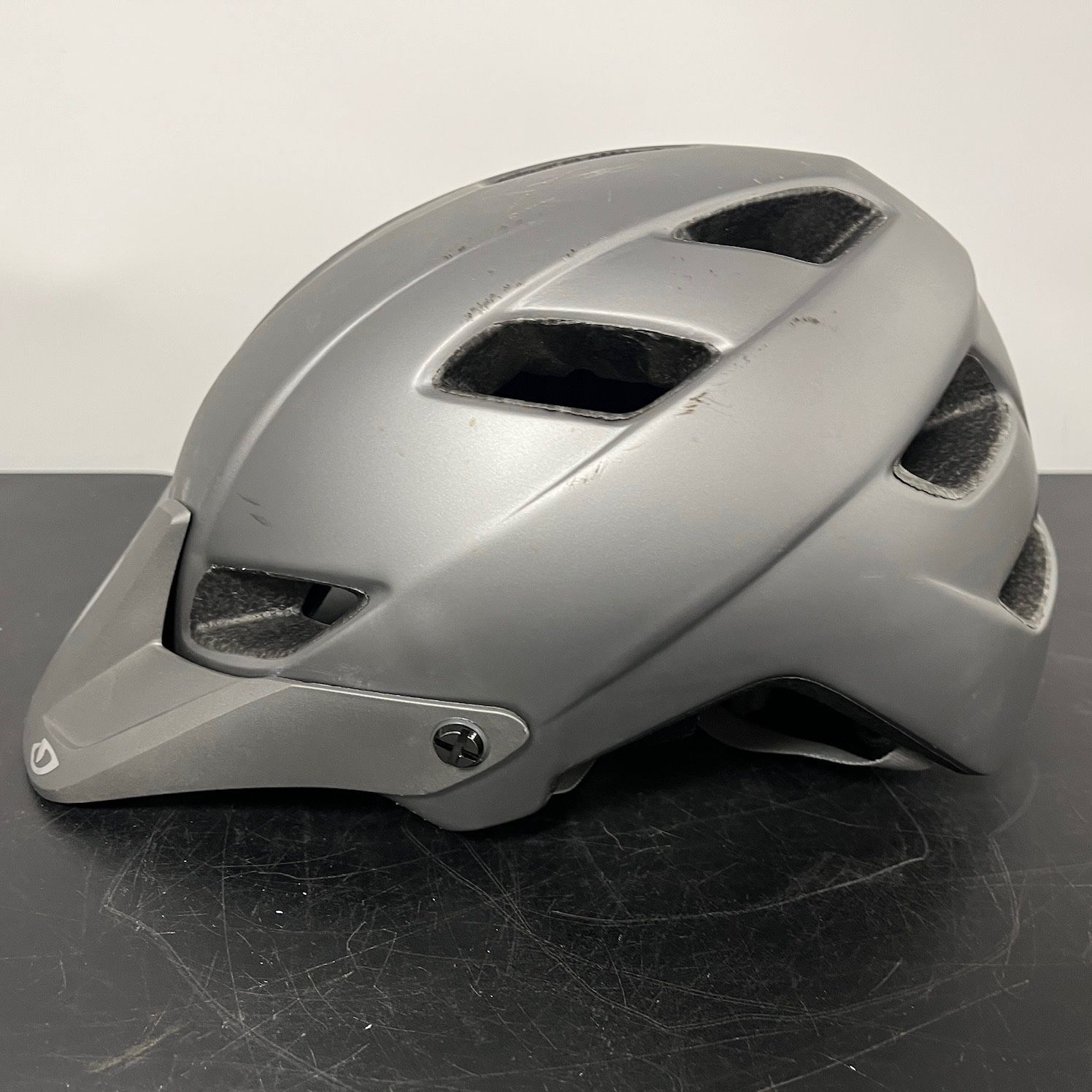 GIRO Feature Adult Bike Helmet. Matte Titanium. Size Medium.
