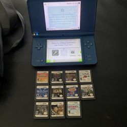 Nintendo DSI  (XL) With 6 Games 