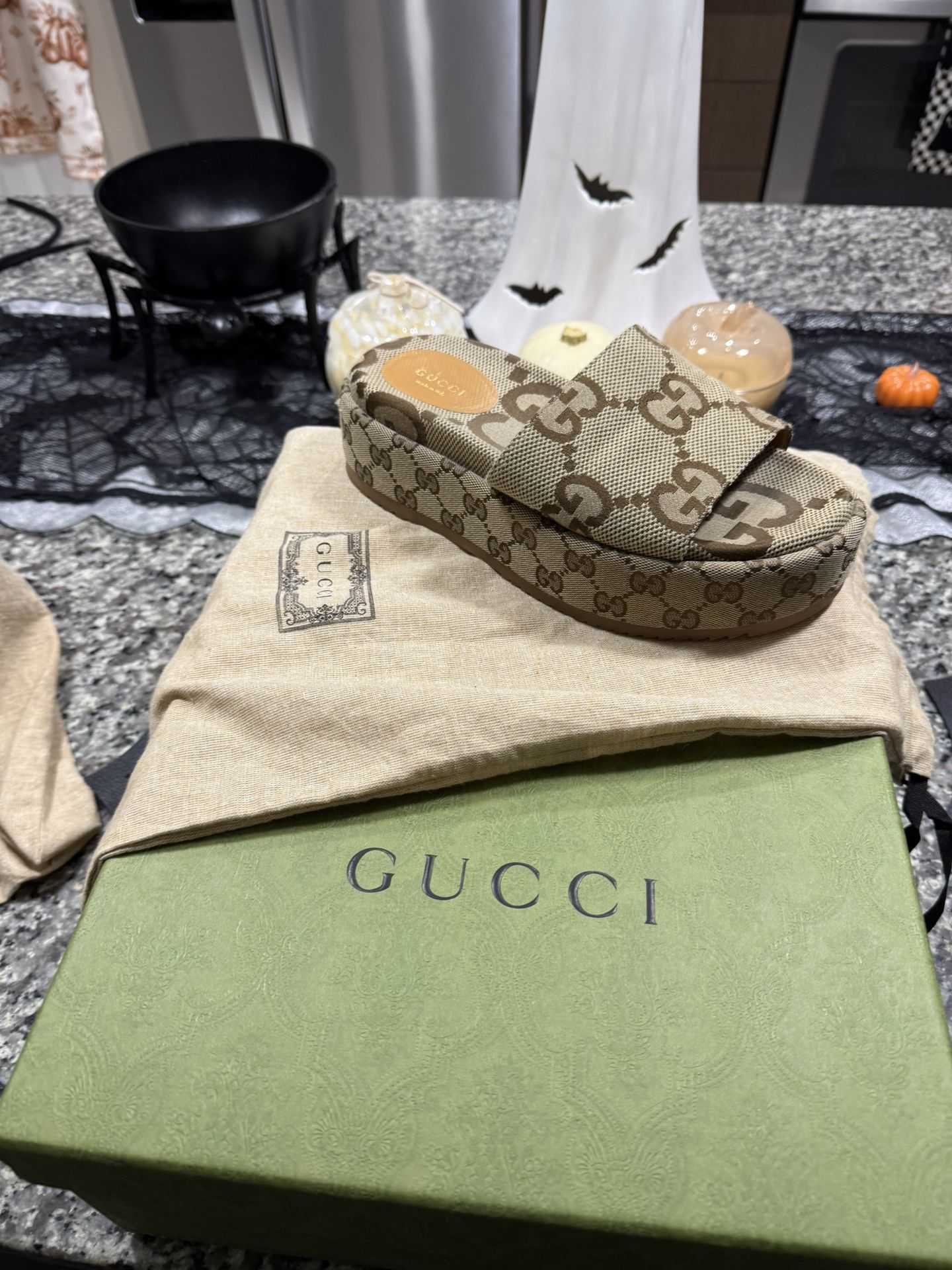 Gucci platform Slides