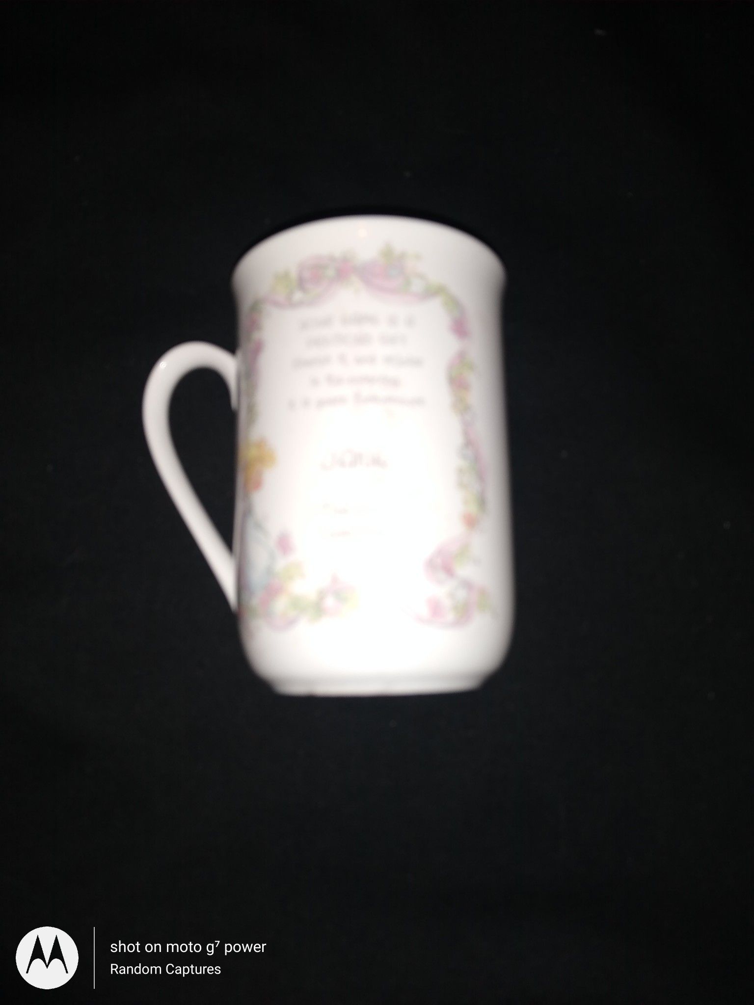 Precious moment cup with the name Jane on it