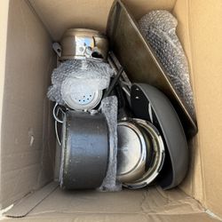Box Of Pots Pans And Cookie Sheets