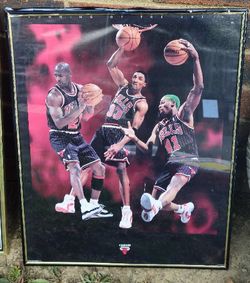 16x20 Vintage poster featuring three prominent Chicago Bulls players from the 1990s: Michael Jordan, Scottie Pippen, and Dennis Rodman. 