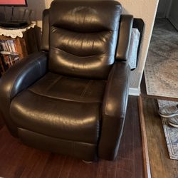Brown electric leather recliner.