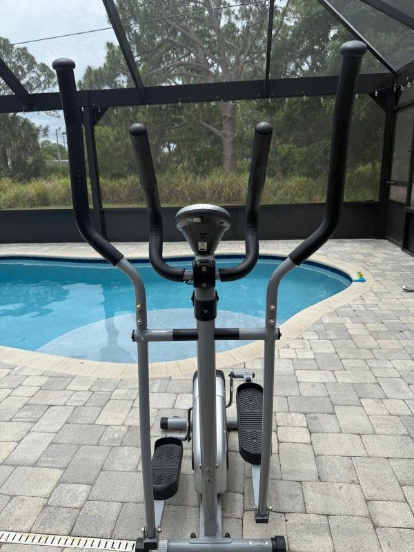 Sunny Health & Fitness Stepping Elliptical Machine SF-E905