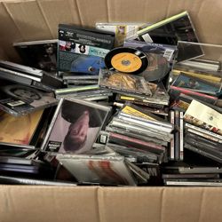 Case Of CDs. 100 Plus