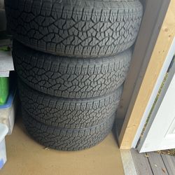 Like New Goodyear Wrangler TrailRunner AT tires with GMC Rims