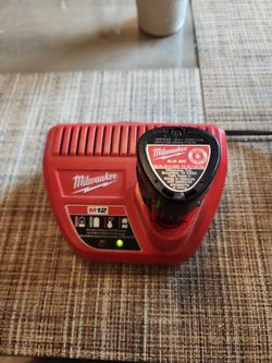 Milwaukee used M12 battery charger for sale.
