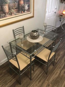 Glass dining table set with 4 chairs