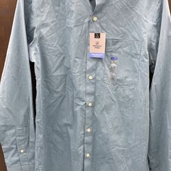 Van Heusen Teal shirt. Item No 573 (Shopgoodwill)