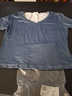 XL blue top still in package $5 it's  a short top